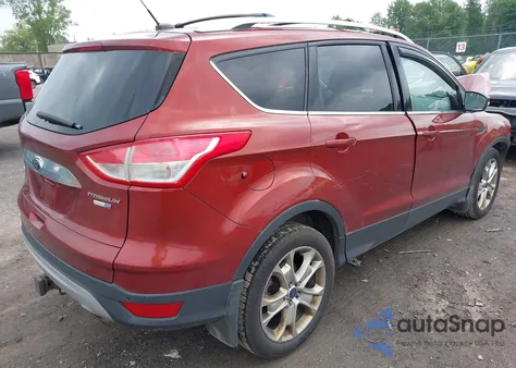 2015 Ford Escape Titanium z USA, uszkodzony, nr VIN 1FMCU9J98FUC84963